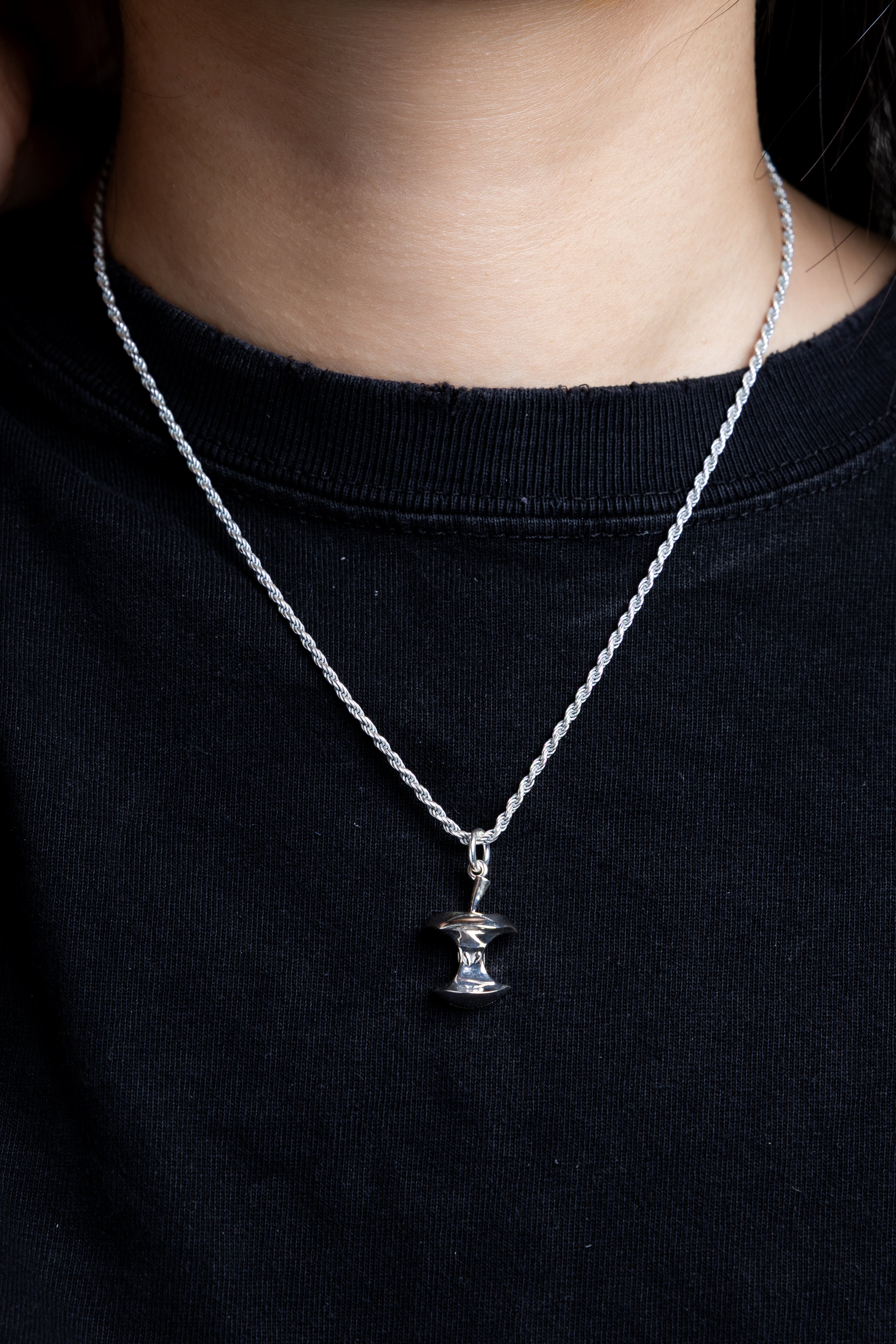 Silver apple core pendant