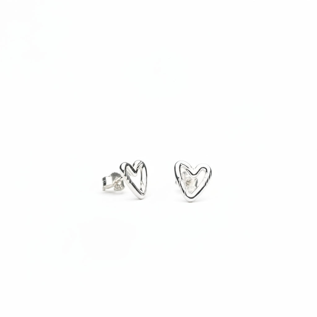 Heart-shaped silver stud earrings