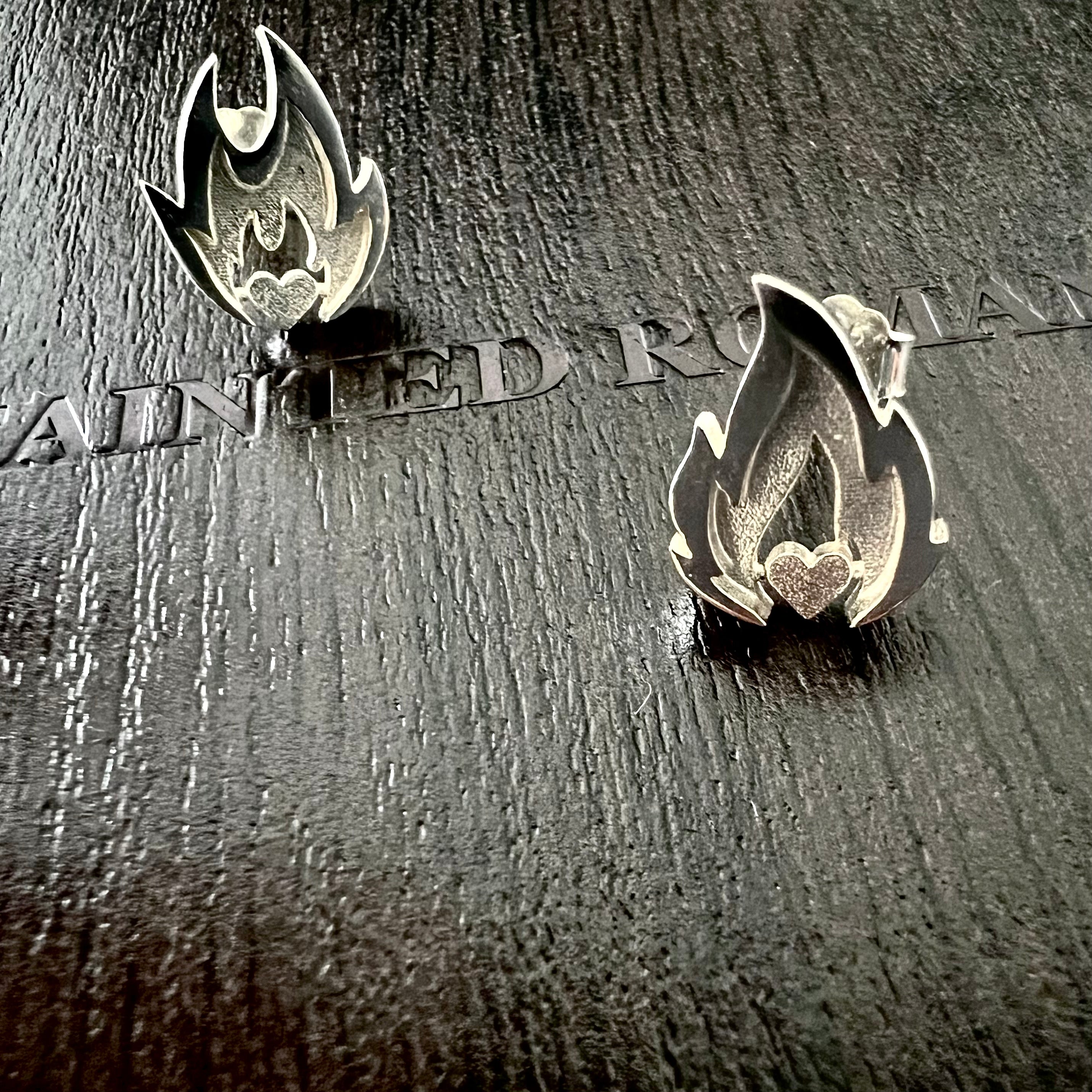 Silver fire flame heart earrings